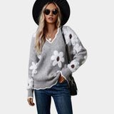 Klára – jersey con cuello de pico y motivo floral