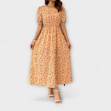 Amelia - Vestido de cuello redondo con estampado floral