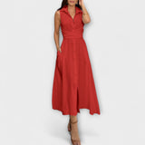 Mira - Impresionante vestido midi con cierre de botones y detalle de lazo en color liso