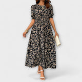 Amelia - Vestido de cuello redondo con estampado floral