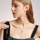 Argiñe™ | Collar de plata con huella y cruz