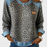 Roxy | Top de estampado de leopardo con ribetes de denim