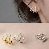 Alma – Pendientes de espiral chapados en oro