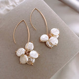 Elegantes pendientes de perlas y cristales
