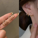 Alma – Pendientes de espiral chapados en oro