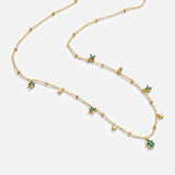 Marta - Collar dorado con colgante verde.