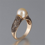 Anillo de oro con perla